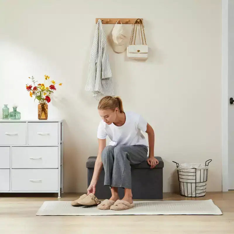 Panca poggiapiedi Okak 76 x 110 cm con contenitore e seduta imbottita in schiuma spessa, pieghevole con grande capacità, panca per la camera da letto o il soggiorno