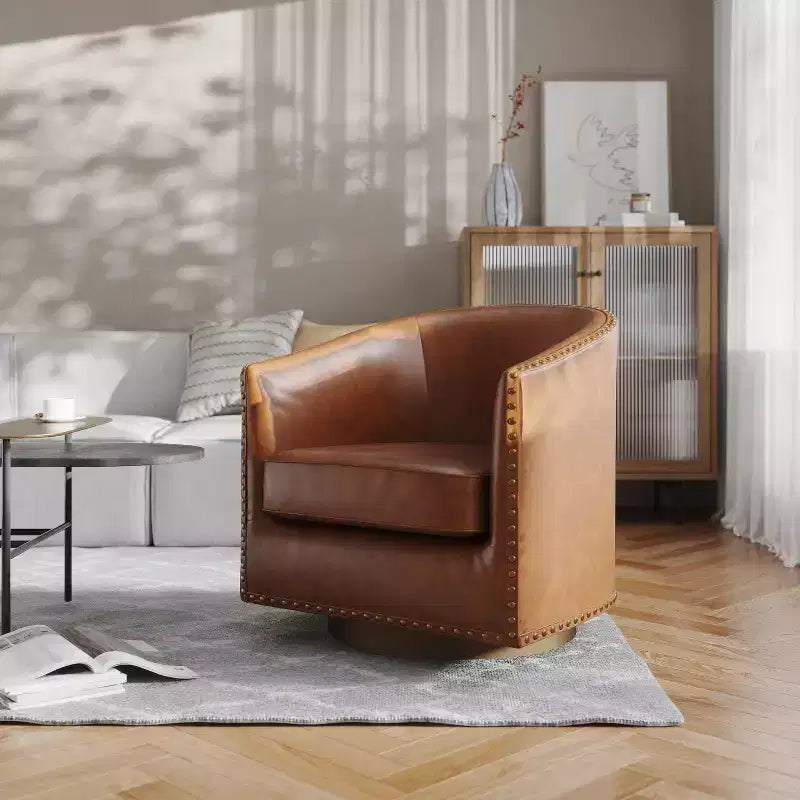 Poltrona Myles stile club commerciale con base girevole in metallo a 360° e rivestimento con borchie decorative